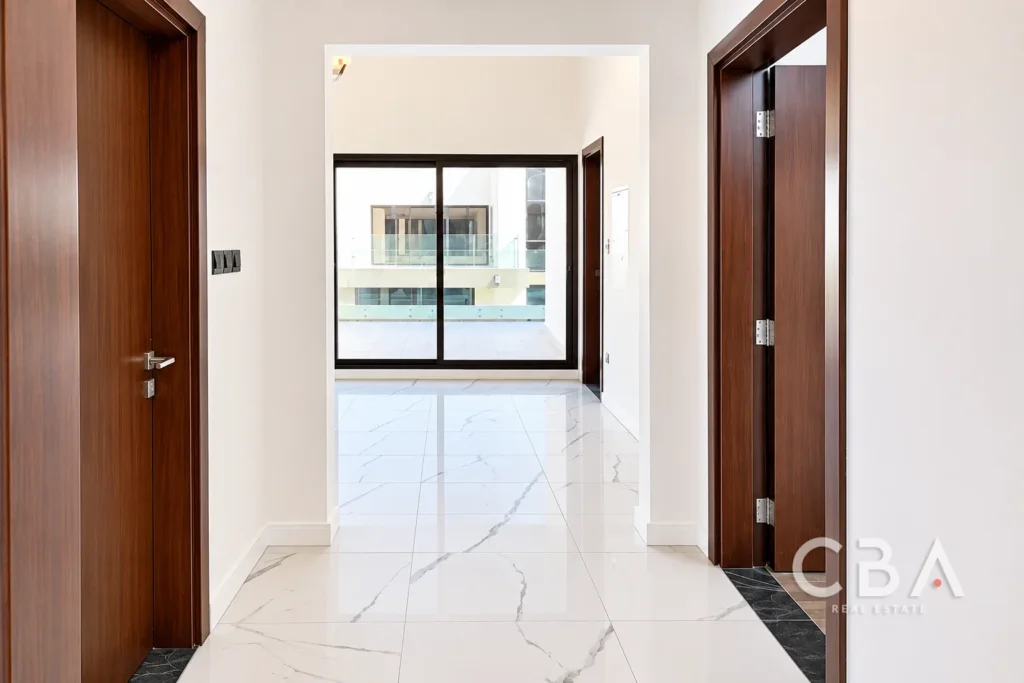 Modern Marble Hallway to Bright Terrace