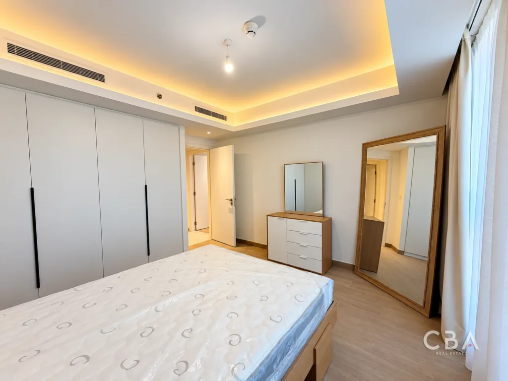 Modern Minimalist Bedroom with Warm Lighting