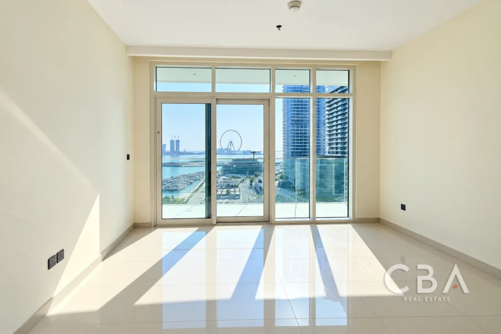 Sunlit Empty Apartment Overlooking Waterfront City