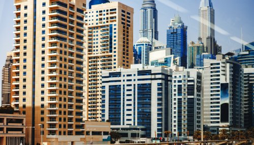 Urban road cityscape of Dubai background at daytime
